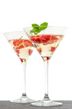 strawberry cocktail with berry in martini glass isolated on whit