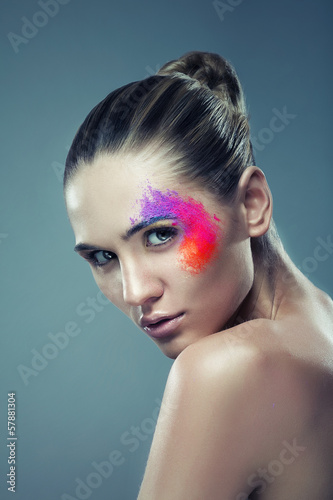 girl with coloured powder on face