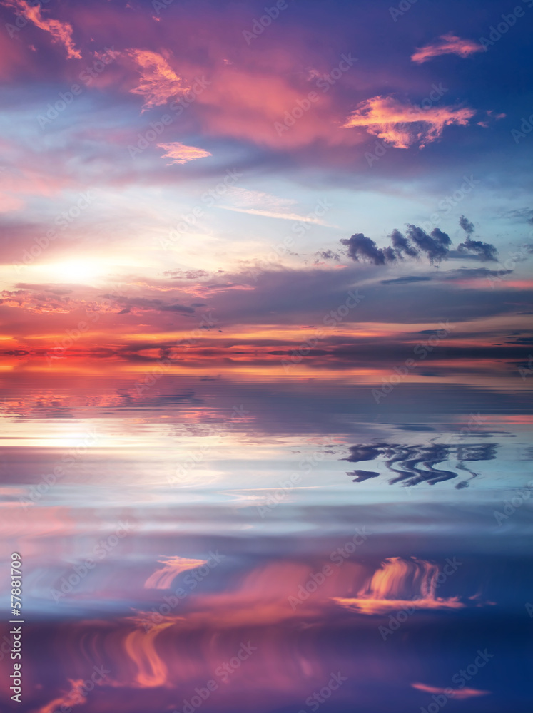 Beautiful colorful sunset sky and ocean. Sky background Beautiful colorful sunset sky and ocean. Sky background