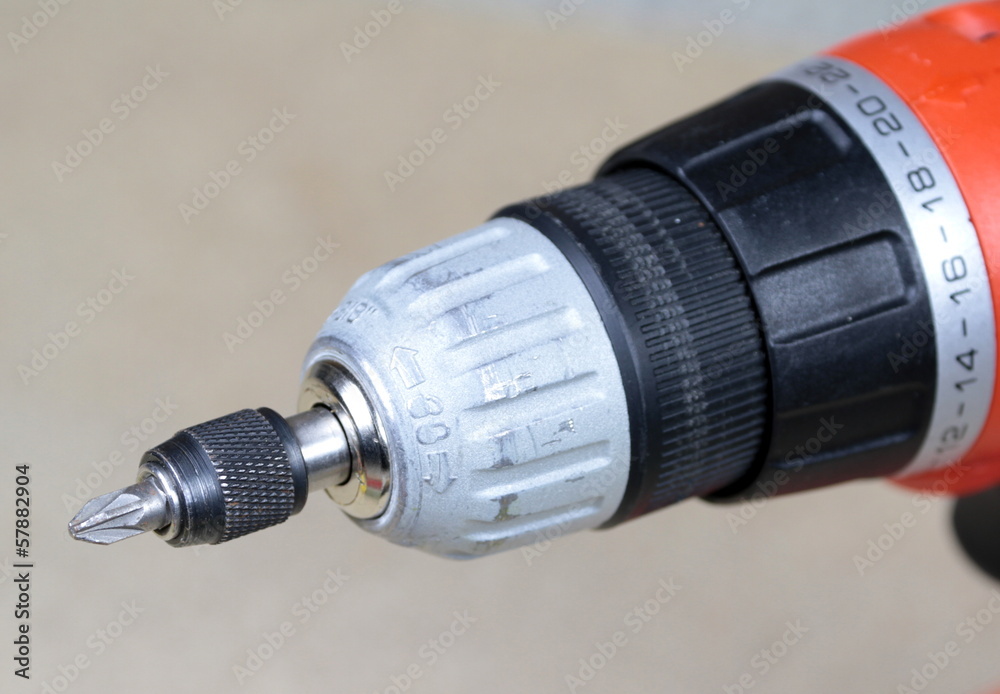 Close up of a battery drill with bit Close up of a battery drill with bit