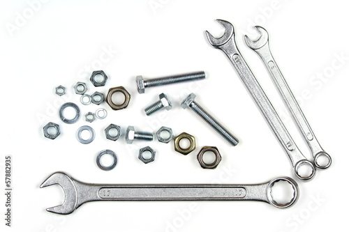 Wrenches, bolts and washers isolated on white background