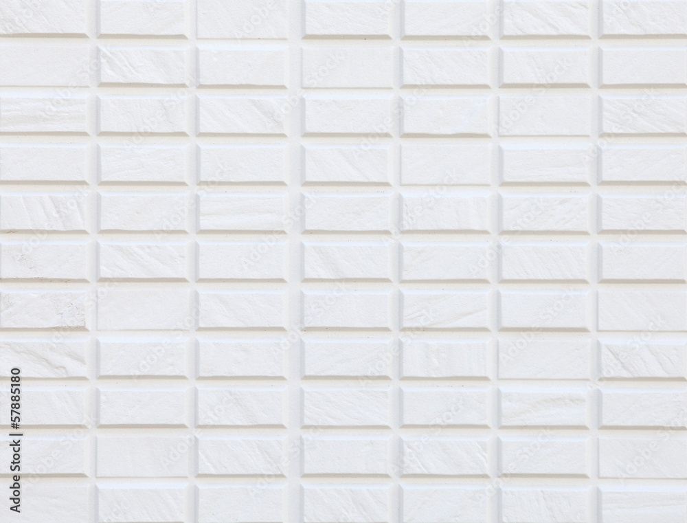Naklejka premium White brick wall, perfect as a background