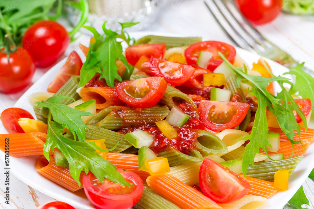 Colorful pasta on a white plate Colorful pasta on a white plate