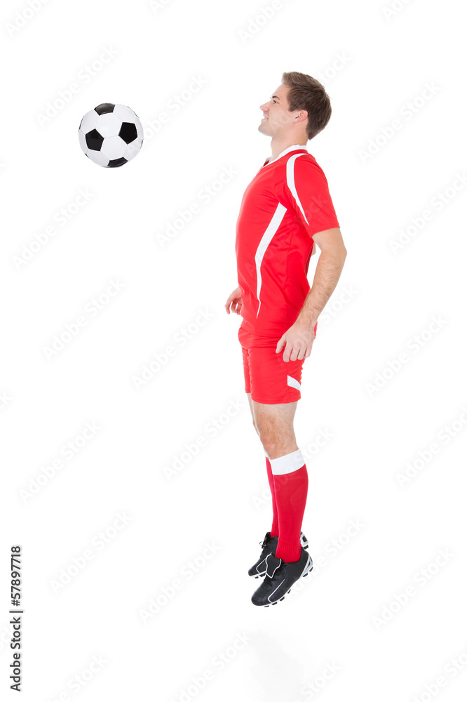 Soccer Player Playing With Football
