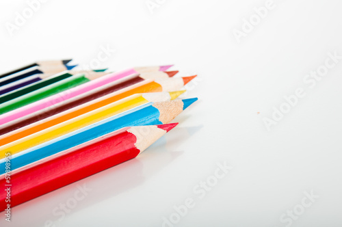 Colorful vivid pencils on white background