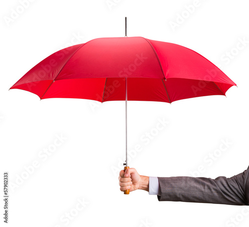 Hand with an red umbrella photo
