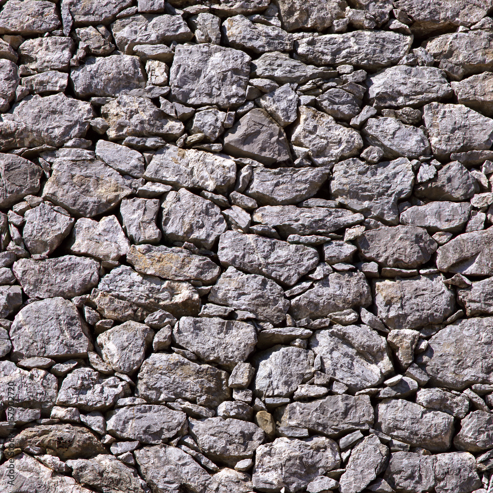 Old gray stone wall texture background. Old gray stone wall texture background.