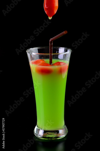 Guava shake drink in glass and tomato