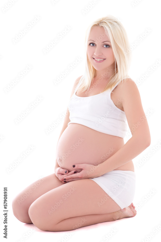young beautiful blondie pregnant woman sitting isolated on white young beautiful blondie pregnant woman sitting isolated on white