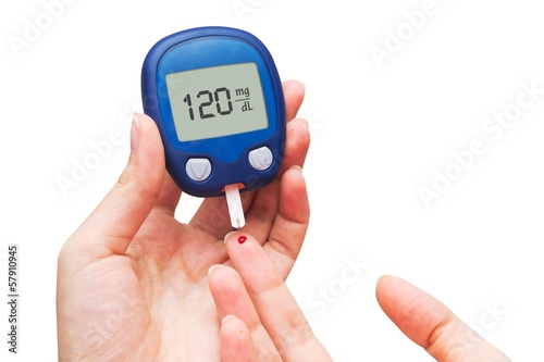 Woman doing blood sugar test