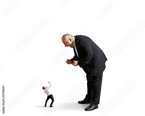 Fotografija boss screaming at small startled worker