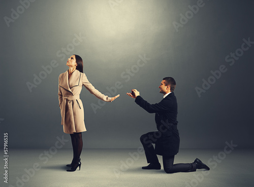 man making proposal of marriage the woman