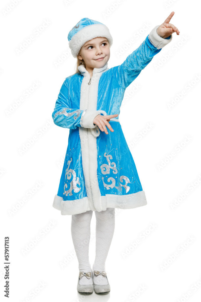 Little girl in blue costume of snow maiden pointing to side Little girl in blue costume of snow maiden pointing to side
