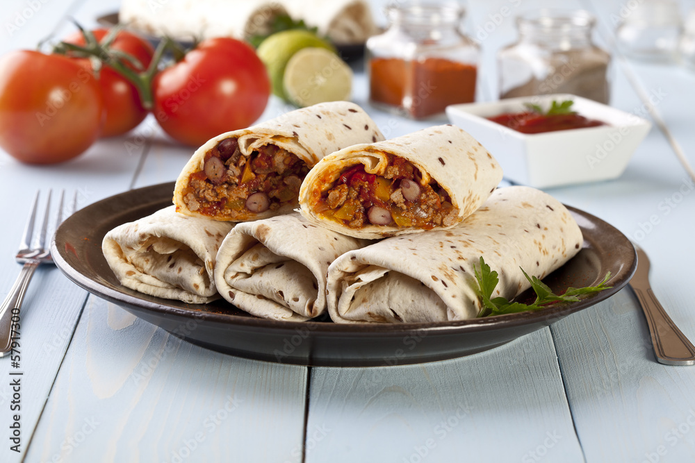 burritos wraps with meat beans and vegetables