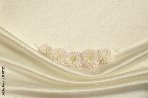 White draped fabric with as...