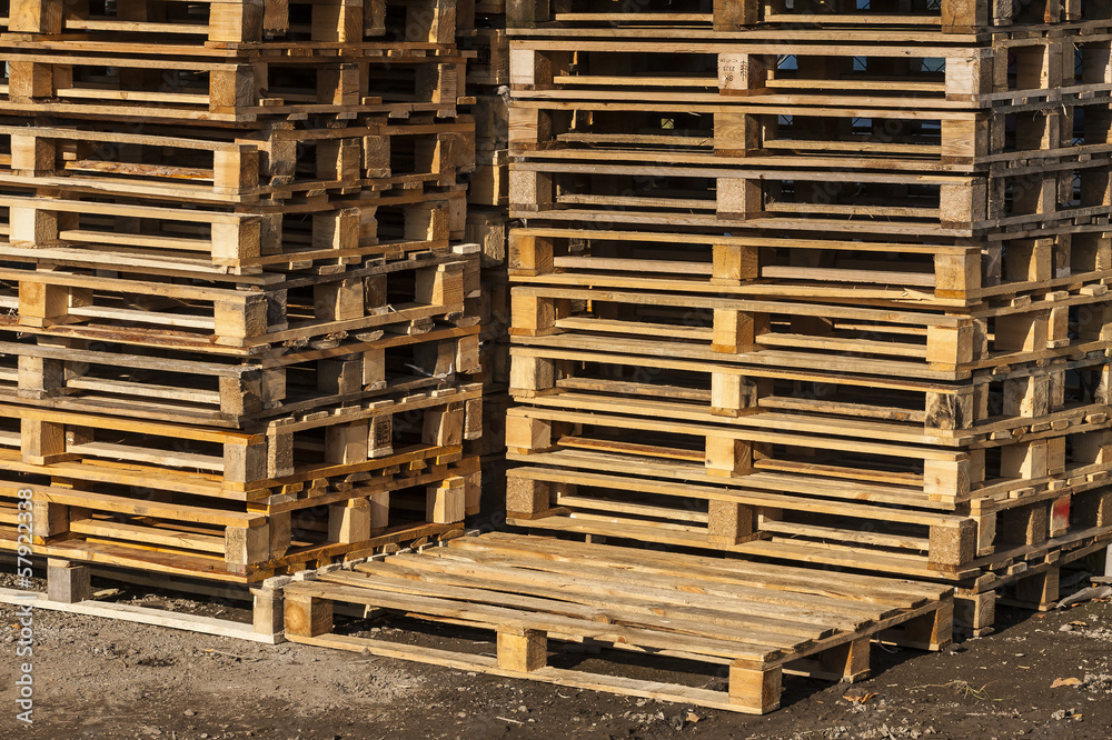 Wooden transport pallets ready for delivery.