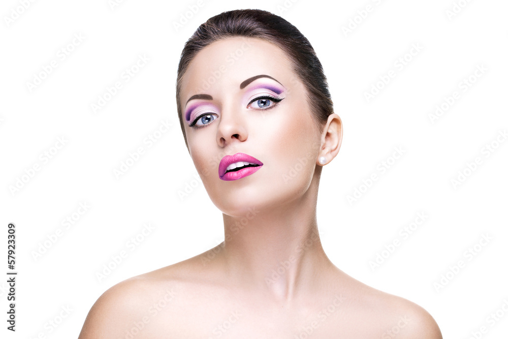 Beauty portrait of the young woman with a stylish violet makeup Beauty portrait of the young woman with a stylish violet makeup