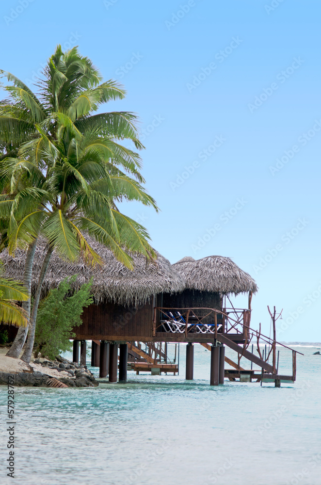 Fototapeta premium Reef Bungalows over tropical coral reef