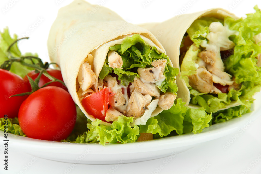 Kebab - grilled meat and vegetables, on plate, isolated on Kebab - grilled meat and vegetables, on plate, isolated on