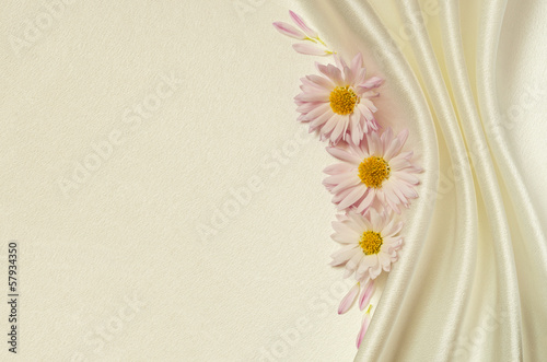 White satin background with...
