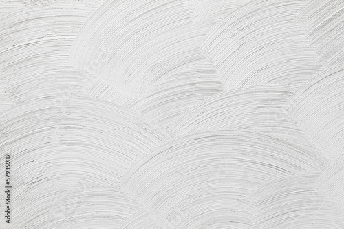 Closeup white concrete wall texture with round plaster decorativ