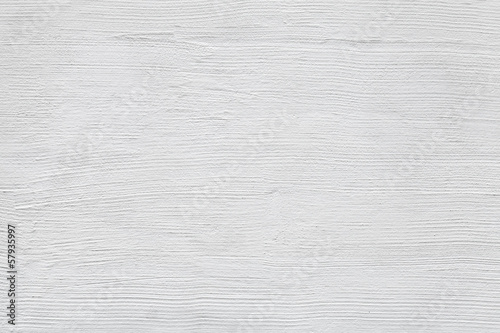 Closeup white concrete wall texture with plaster photo
