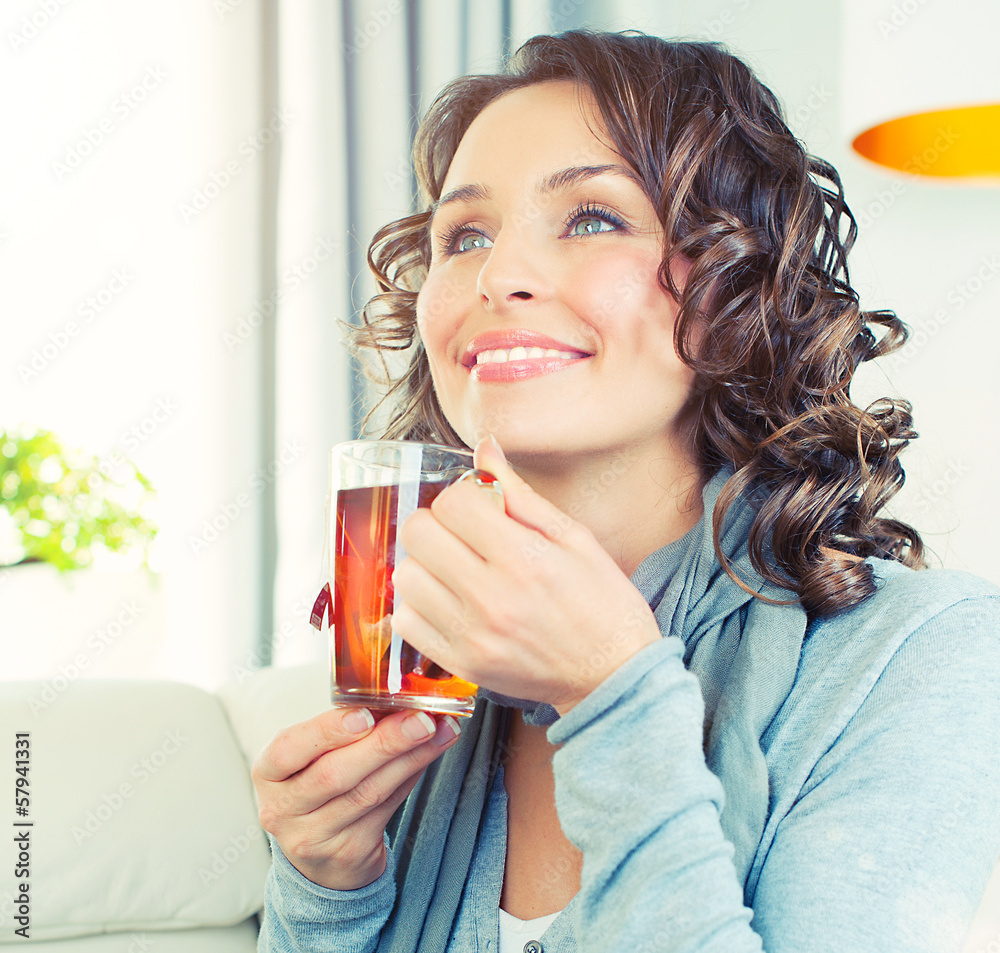 Beautiful Girl Enjoying Coffee. Woman with Cup of Hot Beverage Beautiful Girl Enjoying Coffee. Woman with Cup of Hot Beverage