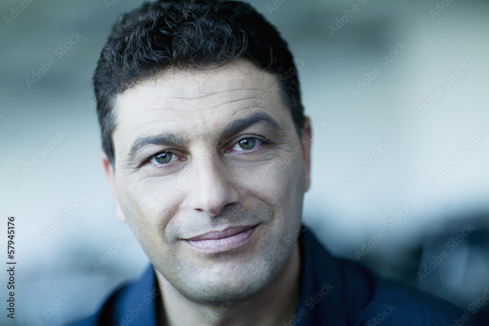 Obraz premium Portrait of smiling businessman, close-up