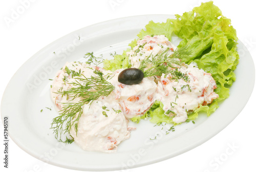 Fresh salad with cocumbers and milk sauce photo