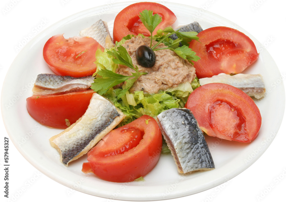 Salad with tomatoes and fish fillet