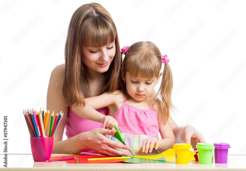 Mother and child draw and cut together Mother and child draw and cut together