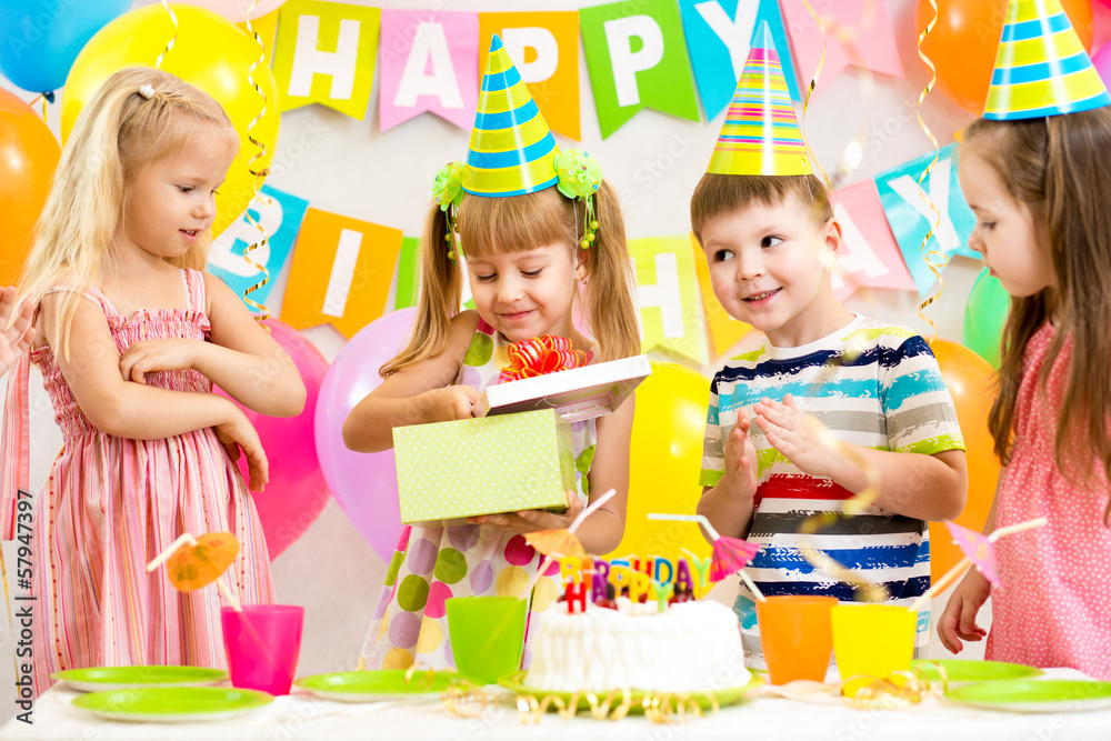 Fototapeta premium happy kids celebrating birthday party