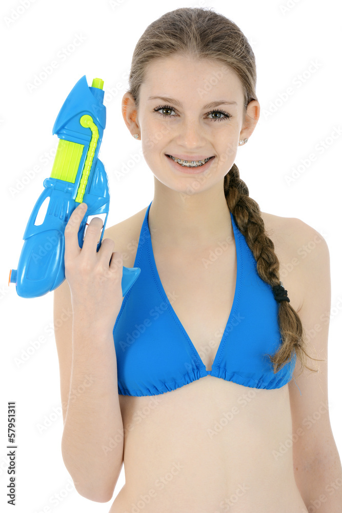 Teenager in Bikini mit Spritzpistole Stock Photo | Adobe Stock