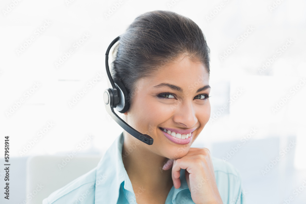 Close up of a businesswoman wearing headset Close up of a businesswoman wearing headset