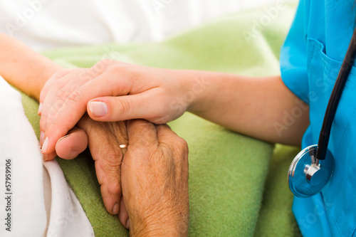 Nurses Helping Elderly photo