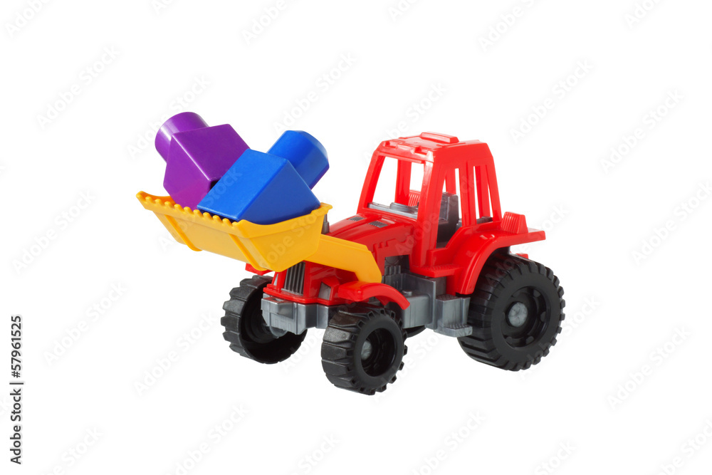 Tractor in the bucket carries designer items Tractor in the bucket carries designer items
