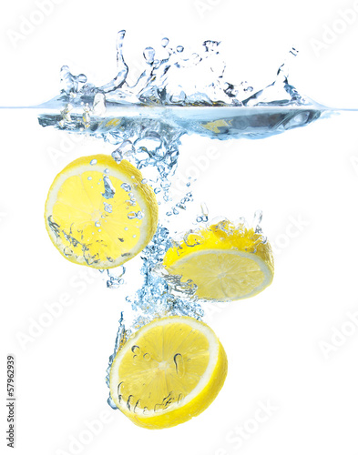 Juicy lemons and water splash. Healthy and tasty food