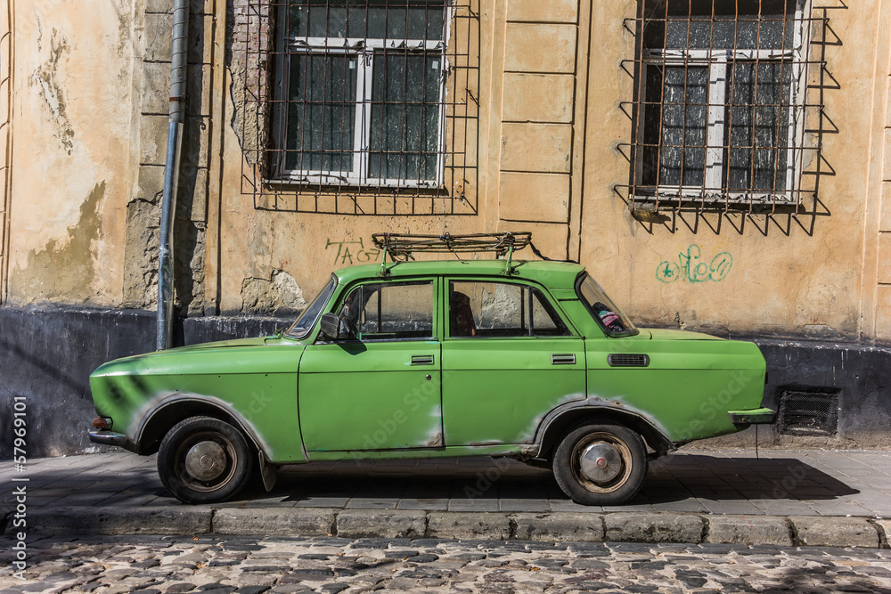 Old green Russian car in Lviv