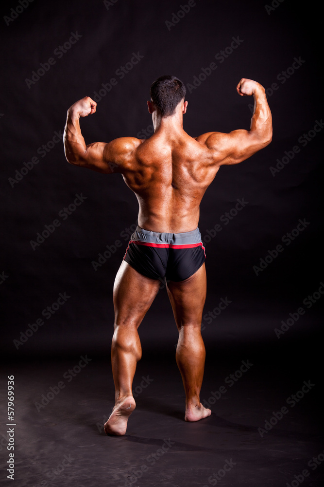 young bodybuilder posing young bodybuilder posing