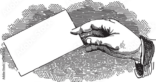 Hand holding business card