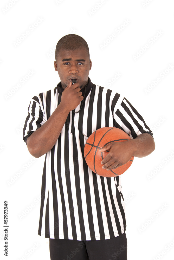 black referee blowing whistle holding basketball Stock Photo | Adobe Stock