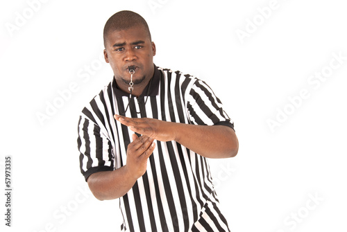 Black referee making a call of technical foul or time out photo