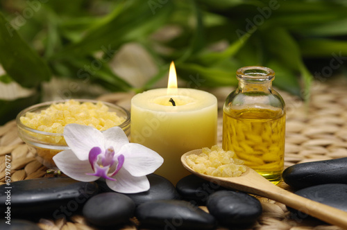 SPA background-candle with white orchid and stones