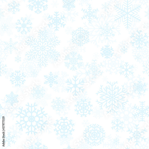 Christmas seamless pattern of light blue snowflakes
