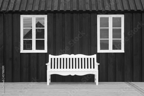 Pakkhusid black wooden warehouse. Iceland. Hofsos. photo