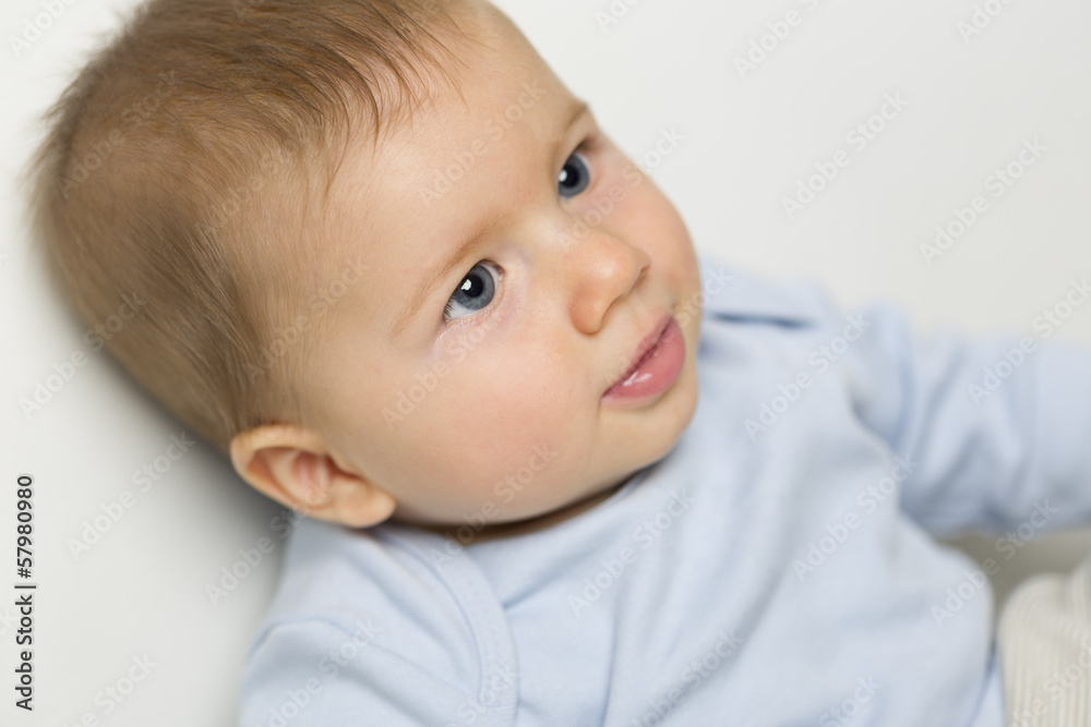 Close up portrait of sweet baby boy with blue eyes. Close up portrait of sweet baby boy with blue eyes.