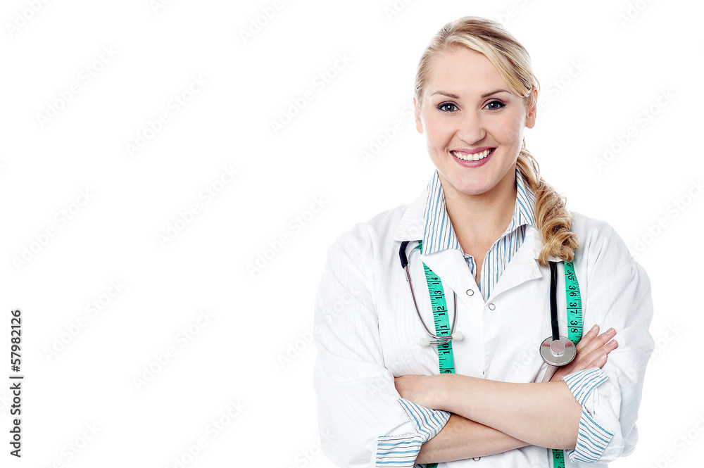 Female surgeon posing with a radiant smile Female surgeon posing with a radiant smile