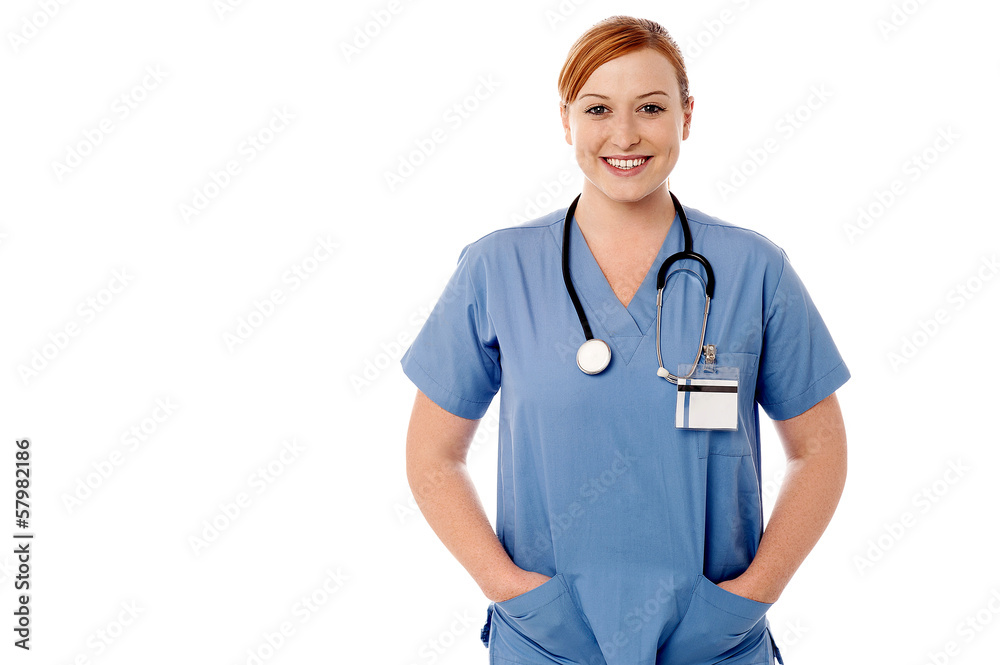 Female physician posing against white