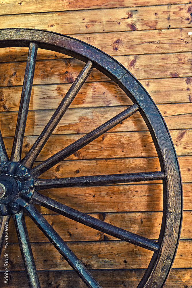 Old horse carriage wooden wheel