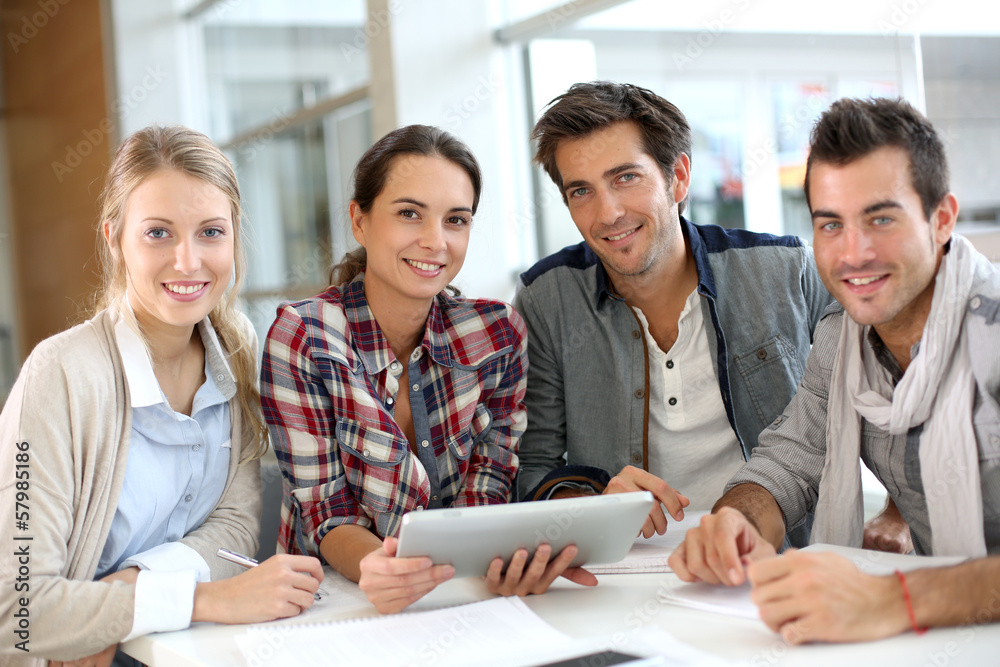 Fototapeta premium Young people meeting with digital tablet